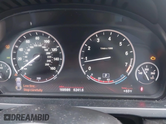 2012 BMW 7 Series 750i with VIN WBAKA8C50CDX01319, listed as a IAAI auction lot 42133359 with 168,986 mi miles and . Bid and sale history available at DreamBid. Image 7.