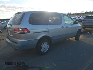 2001 Toyota Sienna CE with VIN 4T3ZF19C31U370820, listed as a IAAI auction lot 41244099 with 166,674 mi miles. Bid and sale history available at carsss.com. Image 4.