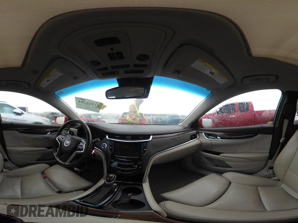 2013 Cadillac XTS Luxury with VIN 2G61P5S32D9115640, listed as a IAAI auction lot 41065284 with 125,643 mi miles and . Bid and sale history available at carsss.com. Image 20.