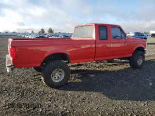 1996 Ford F-150 with VIN 1FTEX14N7TKA17710, listed as a Copart auction lot 76341824 with 215,390 mi miles and Salvage Title. Bid and sale history available at carsss.com. Image 3.