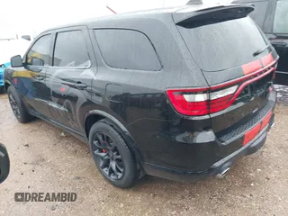 2023 Dodge Durango SRT Hellcat Premium with VIN 1C4SDJH99PC584770, listed as a IAAI auction lot 41562157 with 14,598 mi miles and . Bid and sale history available at DreamBid. Image 3.
