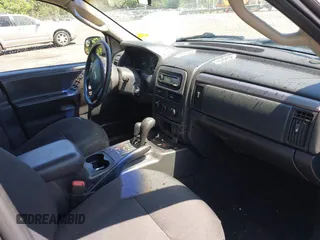 2004 Jeep Grand Cherokee Laredo z VIN 1J4GW48S44C204714, wystawiony jako IAAI lot #42137857 z przebiegiem 251 591 mil mil oraz . Historia ofert i sprzedaży dostępna na DreamBid. Obrazek 5.
