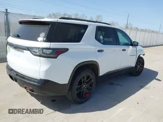 2021 Chevrolet Traverse Premier with VIN 1GNERKKW4MJ164822, listed as a IAAI auction lot 41859580 with 82,383 mi miles. Bid and sale history available at carsss.com. Image 4.