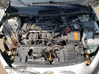 2015 Ford Fiesta SE z VIN 3FADP4EJ7FM169000, wystawiony jako Copart lot #64402674 z przebiegiem 191 221 mil mil oraz Szkoda całkowita • Salvage title. Historia ofert i sprzedaży dostępna na DreamBid. Obrazek 11.