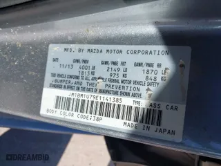 2014 Mazda Mazda3 i Sport with VIN JM1BM1U79E1141385, listed as a IAAI auction lot 41327939 with 132,975 mi miles. Bid and sale history available at carsss.com. Image 9.