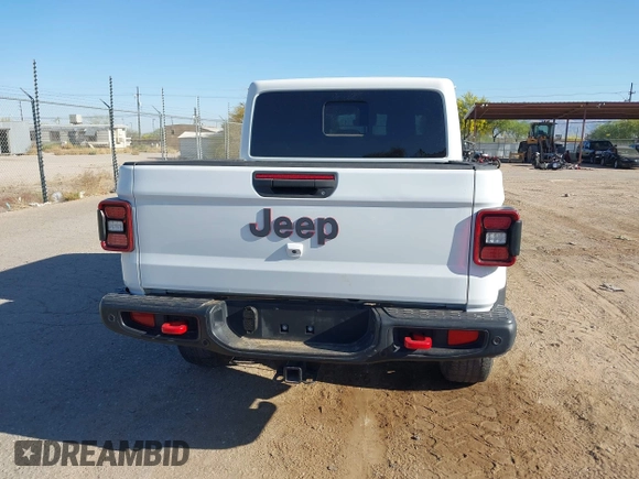 2020 Jeep Gladiator Rubicon with VIN 1C6JJTBG6LL187235, listed as a IAAI auction lot 42010374 with Not Provided miles and . Bid and sale history available at DreamBid. Image 16.