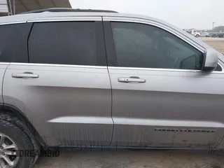 2018 Jeep Grand Cherokee Laredo E with VIN 1C4RJEAG8JC382825, listed as a IAAI auction lot 41288056 with 105,652 mi miles. Bid and sale history available at carsss.com. Image 13.