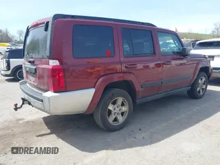 2007 Jeep Commander Sport with VIN 1J8HG48K27C661932, listed as a IAAI auction lot 42132895 with 255,707 mi miles. Bid and sale history available at carsss.com. Image 4.