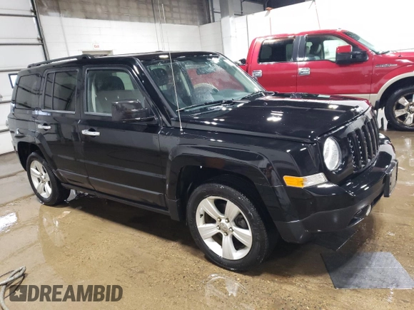 2013 Jeep Patriot Latitude with VIN 1C4NJPFA2DD255341, listed as a Copart auction lot 85511244 with 129,873 mi miles and Clean Title. Bid and sale history available at carsss.com. Image 4.