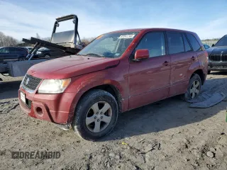 2012 Suzuki Grand Vitara Premium z VIN JS3TD0D65C4100898, wystawiony jako Copart lot #87241744 z przebiegiem Nie podano mil oraz Szkoda całkowita • Salvage title. Historia ofert i sprzedaży dostępna na DreamBid. Obrazek 1.
