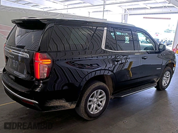 2022 Chevrolet Tahoe LS z VIN 1GNSKMKD7NR129745, wystawiony jako IAAI lot #42566236 z przebiegiem 95 126 mil mil oraz . Historia ofert i sprzedaży dostępna na DreamBid. Obrazek 13.
