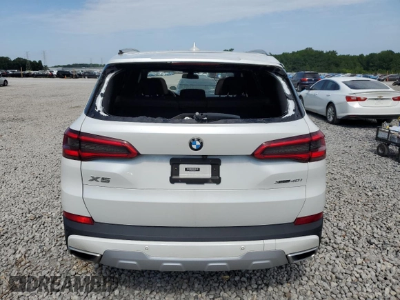 2019 BMW X5 xDrive40i with VIN 5UXCR6C5XKLK80703, listed as a Copart auction lot 63473495 with 57,260 mi miles and Salvage title. Bid and sale history available at DreamBid. Image 6.
