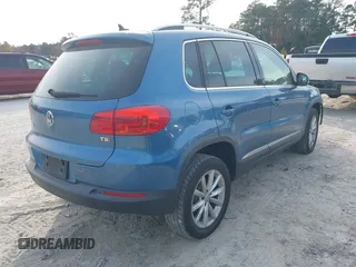 2017 Volkswagen Tiguan Wolfsburg Edition with VIN WVGRV7AX6HW504313, listed as a IAAI auction lot 40950812 with 149,884 mi miles and . Bid and sale history available at DreamBid. Image 4.