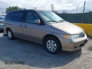 2003 Honda Odyssey EX-L z VIN 5FNRL18983B060704, wystawiony jako IAAI lot #42261040 z przebiegiem 135 923 mil mil oraz . Historia ofert i sprzedaży dostępna na DreamBid. Obrazek 1.