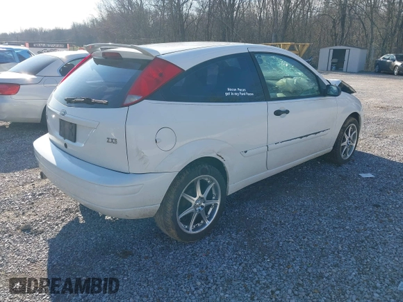 2004 Ford Focus ZX3 with VIN 3FAFP313X4R107035, listed as a IAAI auction lot 41204355 with 185,081 mi miles and . Bid and sale history available at carsss.com. Image 4.