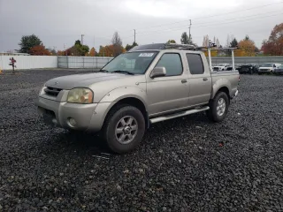 2003 Nissan Frontier XE with VIN 1N6ED27T13C440122, listed as a Copart auction lot 78447574 with 317,472 mi miles and Salvage title. Bid and sale history available at DreamBid. Image 1.