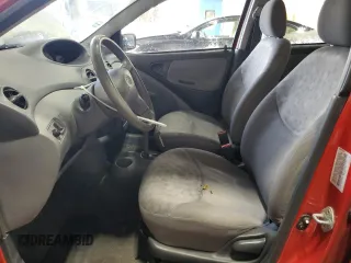 2000 Toyota ECHO with VIN JTDBT1237Y0095990, listed as a Copart auction lot 89140295 with 214,941 mi miles and Salvage Title. Bid and sale history available at DreamBid. Image 7.