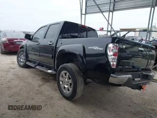2012 GMC Canyon with VIN 1GTH5PFE0C8162961, listed as a IAAI auction lot 41635311 with 198,553 mi miles and . Bid and sale history available at DreamBid. Image 3.