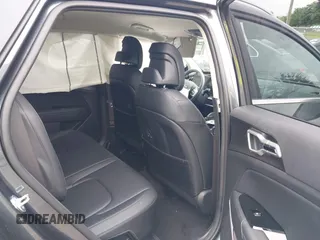 2023 Kia Sportage EX with VIN KNDPVCAG1P7110909, listed as a IAAI auction lot 42646436 with 16,304 mi miles and . Bid and sale history available at DreamBid. Image 8.
