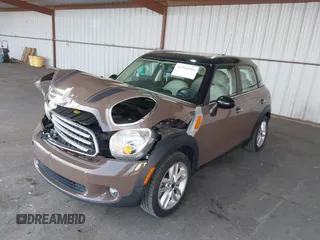 2012 MINI Countryman with VIN WMWZB3C51CWM04563, listed as a IAAI auction lot 42564564 with 95,760 mi miles and . Bid and sale history available at DreamBid. Image 17.