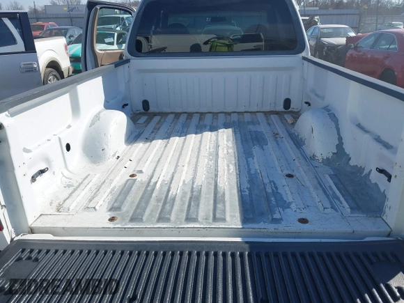 1999 Ford F-150 XL with VIN 1FTRX18L3XKB33860, listed as a IAAI auction lot 41664761 with 305,767 mi miles. Bid and sale history available at carsss.com. Image 12.