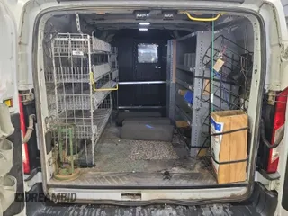 2016 Ford Transit Cargo z VIN 1FTYE1YM9GKB19505, wystawiony jako IAAI lot #42774251 z przebiegiem 252 184 mil mil oraz . Historia ofert i sprzedaży dostępna na DreamBid. Obrazek 8.
