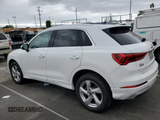 2021 Audi Q3 Premium with VIN WA1AUCF39M1061658, listed as a Copart auction lot 50717875 with 87,363 mi miles and Salvage title. Bid and sale history available at DreamBid. Image 2.
