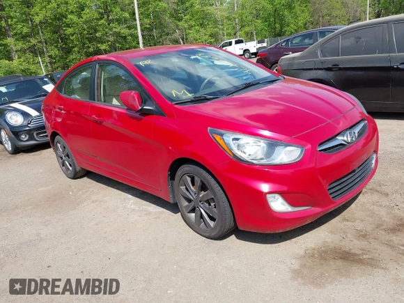 2012 Hyundai Accent GLS with VIN KMHCU4AE3CU210782, listed as a IAAI auction lot 42159648 with 113,327 mi miles. Bid and sale history available at carsss.com. Image 1.