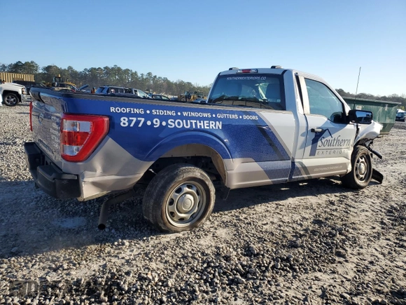 2023 Ford F-150 XL with VIN 1FTMF1CB2PKG05574, listed as a Copart auction lot 49050295 with 33,563 mi miles and Salvage Title. Bid and sale history available at carsss.com. Image 3.
