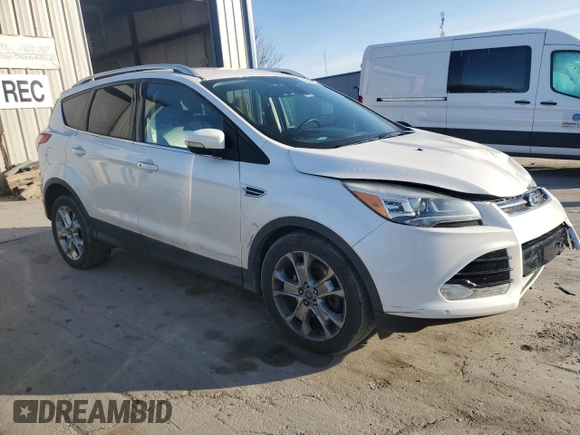 2015 Ford Escape Titanium with VIN 1FMCU9J98FUA48085, listed as a Copart auction lot 53668985 with 205,609 mi miles and Salvage Title. Bid and sale history available at carsss.com. Image 4.