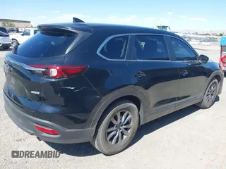 2018 Mazda CX-9 Sport with VIN JM3TCABY8J0223750, listed as a IAAI auction lot 42155429 with 133,543 mi miles and . Bid and sale history available at DreamBid. Image 4.