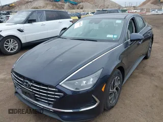 2021 Hyundai Sonata Hybrid Blue with VIN KMHL24JJXMA035579, listed as a IAAI auction lot 41688249 with 31,726 mi miles. Bid and sale history available at carsss.com. Image 2.