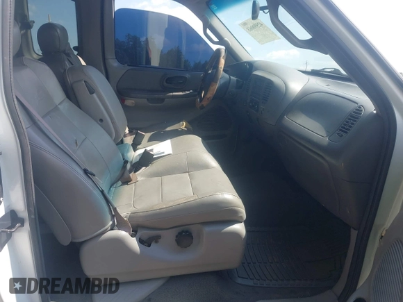 2001 Ford F-150 XL with VIN 1FTRX18L71NB11026, listed as a IAAI auction lot 42590063 with 218,156 mi miles and . Bid and sale history available at DreamBid. Image 5.