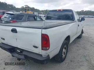 2004 Ford F-150 XL with VIN 2FTRF17W24CA02353, listed as a IAAI auction lot 41935141 with 306,280 mi miles and . Bid and sale history available at DreamBid. Image 4.