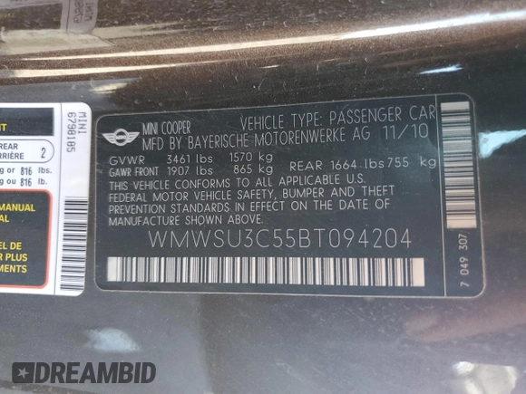 2011 MINI Hardtop z VIN WMWSU3C55BT094204, wystawiony jako Copart lot #53994195 z przebiegiem 132 938 mil mil oraz Tytuł czysty. Historia ofert i sprzedaży dostępna na DreamBid. Obrazek 12.
