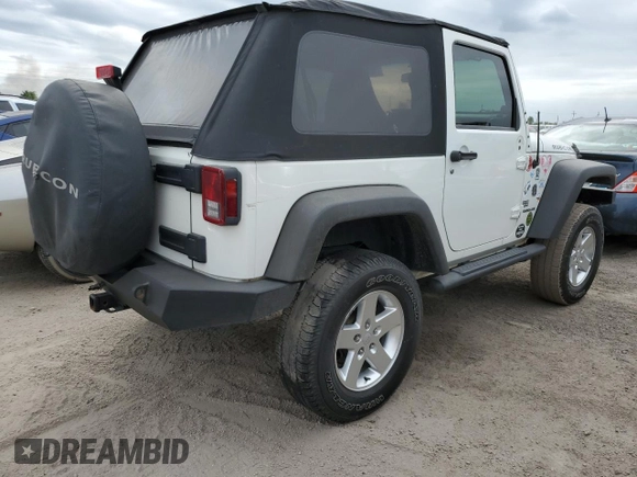 2009 Jeep Wrangler Rubicon with VIN 1J4GA64149L707142, listed as a Copart auction lot 76387344 with Not Provided miles and Salvage Title. Bid and sale history available at DreamBid. Image 3.