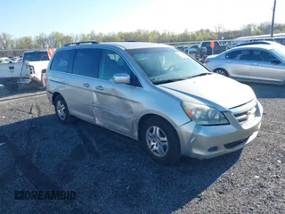 2005 Honda Odyssey EX with VIN 5FNRL38445B411188, listed as a IAAI auction lot 42060307 with 240,688 mi miles. Bid and sale history available at carsss.com. Image 1.