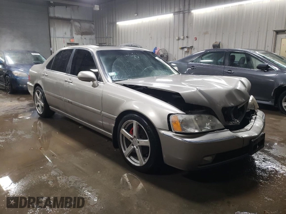 2002 Acura RL z VIN JH4KA96502C012064, wystawiony jako Copart lot #88080895 z przebiegiem 107 477 mil mil oraz Szkoda całkowita • Salvage title. Historia ofert i sprzedaży dostępna na DreamBid. Obrazek 4.