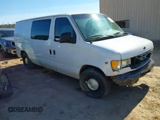 1999 Ford Econoline Cargo with VIN 1FTRE14W0XHB64440, listed as a IAAI auction lot 41645551 with 239,114 mi miles. Bid and sale history available at carsss.com. Image 1.