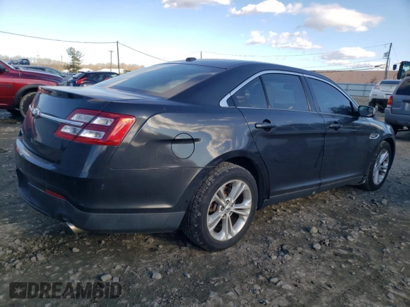 2013 Ford Taurus SEL with VIN 1FAHP2H89DG106115, listed as a Copart auction lot 43340065 with 196,946 mi miles and Clean Title. Bid and sale history available at DreamBid. Image 3.