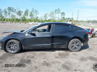 2023 Tesla Model 3 with VIN 5YJ3E1EA3PF681515, listed as a IAAI auction lot 41899053 with 15,985 mi miles and . Bid and sale history available at carsss.com. Image 14.