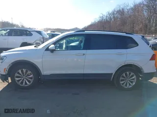 2018 Volkswagen Tiguan S with VIN 3VV1B7AX1JM015870, listed as a IAAI auction lot 41632032 with 82,578 mi miles. Bid and sale history available at carsss.com. Image 14.