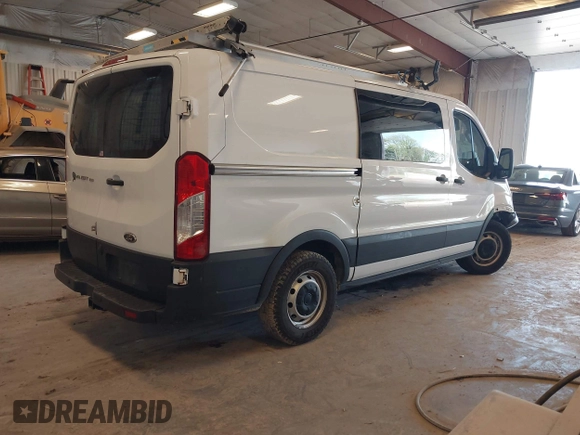 2019 Ford Transit with VIN 1FTYE1YM0KKB77849, listed as a IAAI auction lot 42175880 with 151,828 mi miles. Bid and sale history available at carsss.com. Image 4.
