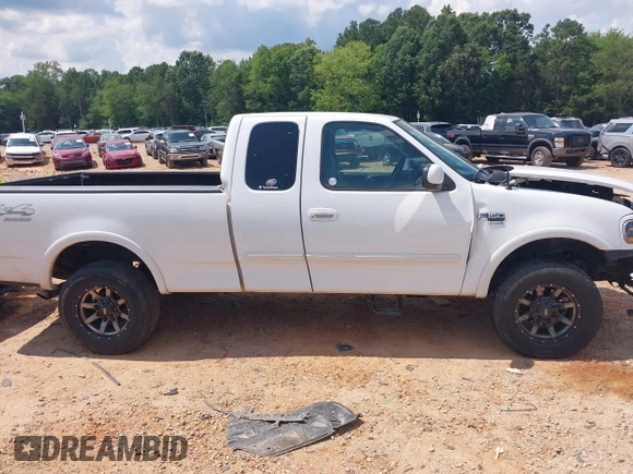 1999 Ford F-150 XL with VIN 1FTRX18L5XNA50607, listed as a IAAI auction lot 42626517 with Not provided miles and . Bid and sale history available at DreamBid. Image 13.