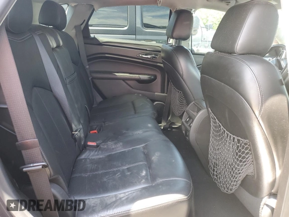 2015 Cadillac SRX z VIN 3GYFNAE31FS571500, wystawiony jako Copart lot #54106885 z przebiegiem 123 114 mil mil oraz Szkoda całkowita • Salvage title. Historia ofert i sprzedaży dostępna na DreamBid. Obrazek 11.