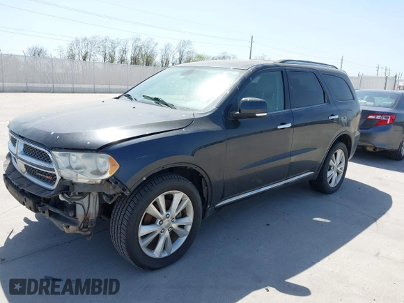 2013 Dodge Durango Crew with VIN 1C4SDHDT5DC637535, listed as a IAAI auction lot 41867982 with 162,569 mi miles and . Bid and sale history available at DreamBid. Image 17.