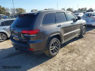 2018 Jeep Grand Cherokee Trailhawk with VIN 1C4RJFLT9JC244212, listed as a IAAI auction lot 41443469 with NaN miles. Bid and sale history available at carsss.com. Image 4.