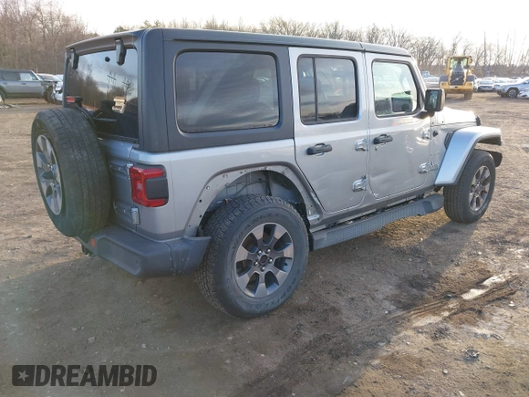 2018 Jeep Wrangler Unlimited Sahara z VIN 1C4HJXEN4JW173435, wystawiony jako IAAI lot #41453040 z przebiegiem 51 530 mil mil oraz . Historia ofert i sprzedaży dostępna na DreamBid. Obrazek 4.