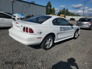 1997 Ford Mustang with VIN 1FALP4042VF119326, listed as a Copart auction lot 69286674 with 120,842 mi miles and Salvage Title. Bid and sale history available at carsss.com. Image 3.
