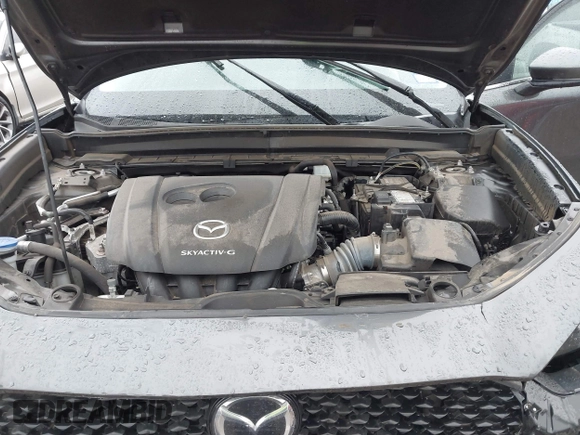2021 Mazda CX-30 Select with VIN 3MVDMABL9MM272440, listed as a IAAI auction lot 41538691 with 55,069 mi miles and . Bid and sale history available at DreamBid. Image 10.